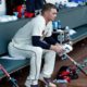 Photo of Sean Newcomb in dugout at Braves + Dodgers game