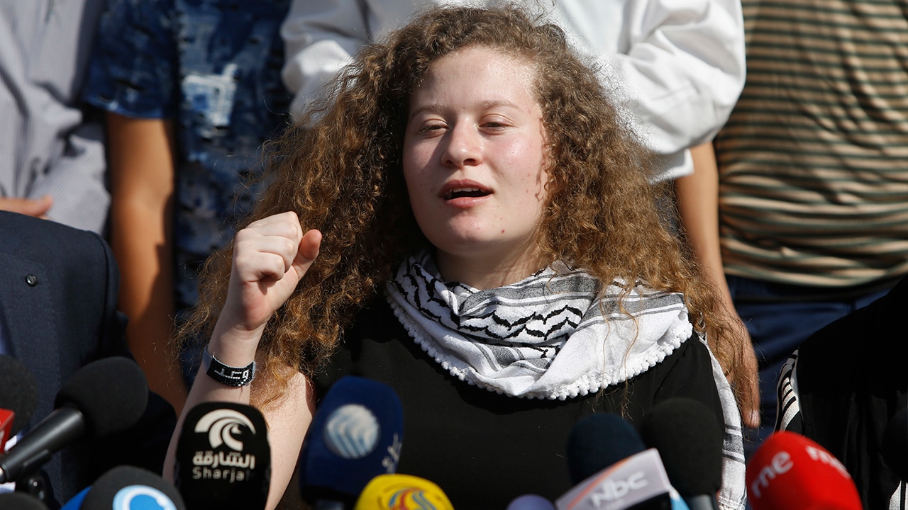 Photo of Ahed Tamimi speaking at a press conference