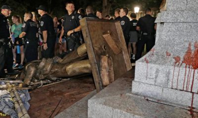 Photo of toppled "Silent Sam" statue at UNC after protest