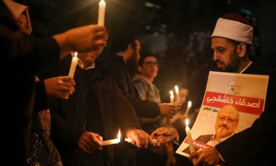 Photo of activists protesting the killing of Saudi journalist Jamal Khashoggi