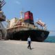 Photo of a cargo ship is docked at the port, in Hodeida, Yemen.