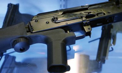 Photo of a bump stock attached to a semi-automatic rifle