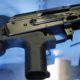 Photo of a bump stock attached to a semi-automatic rifle