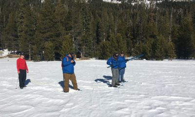 Photo of first Sierra snowpack measurement of 2019