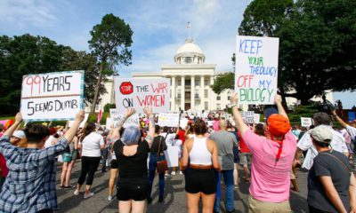 Photo of protestor's for women's rights holding a rally in Alabama