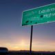 Photo of a car moving along the Extraterrestrial Highway