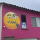 Pink house with emoji