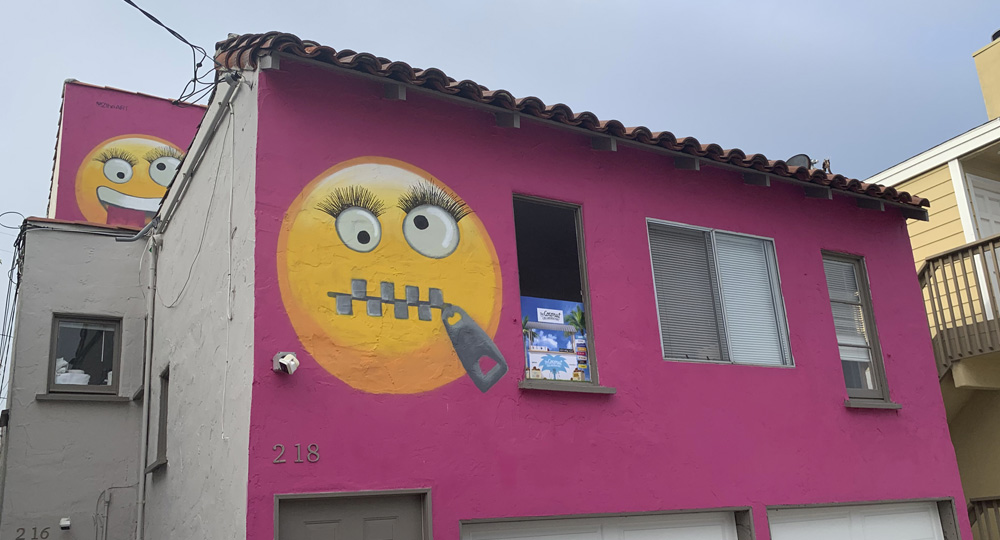 Pink house with emoji