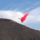 Photo of plane dropping fire retardant on the Briceburg Fire