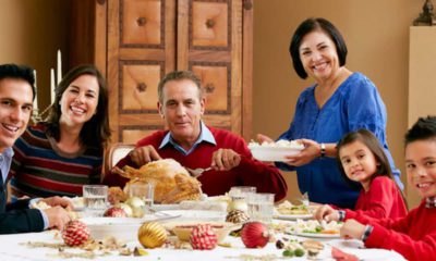 Photo of a family at Thanksgiving dinner