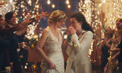 Photo of a scene of Zola's advertisement featuring two brides