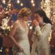 Photo of a scene of Zola's advertisement featuring two brides