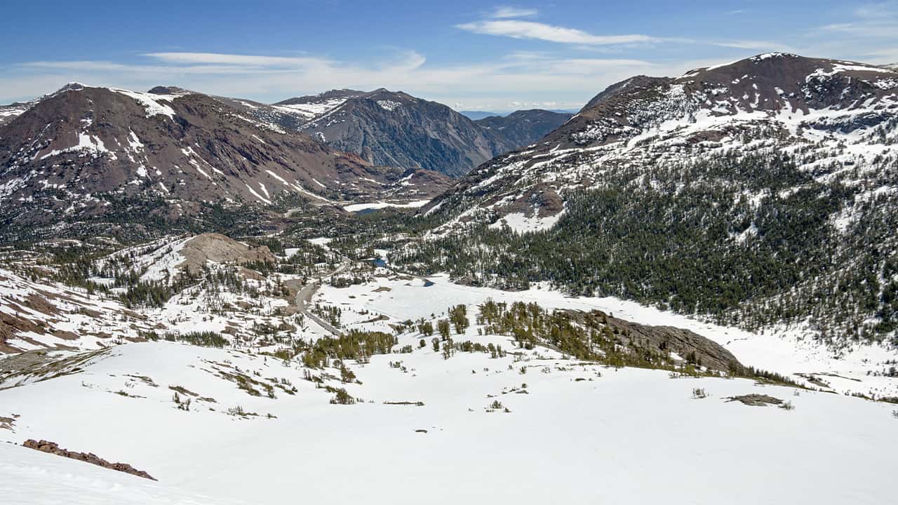 Photo of the view from Gaylor Peak down to the east side of Tioga Pass during winter
