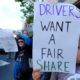 Photo of Uber and Lyft drivers during a demonstration
