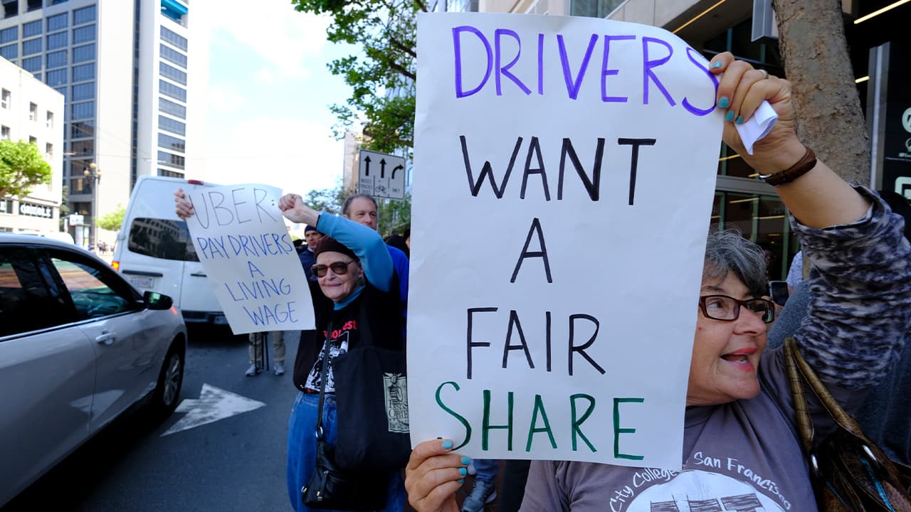 Photo of Uber and Lyft drivers during a demonstration