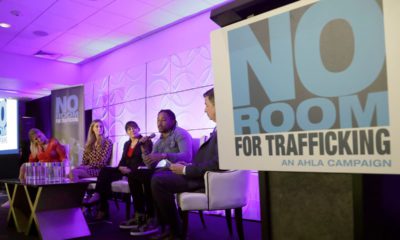 Photo of Miami Dolphins wide receiver Albert Wilson speaking during a meeting between law enforcement officials and hotel groups to announce a campaign to prevent human trafficking