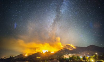 Photo of the Way Fire burning at night in the hills above Wofford Heights in California's Kern County.