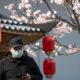 Photo of a man wearing a mask in Beijing, China