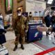 Photo of officers and soldiers checking passengers leaving from Milan main train station, Italy