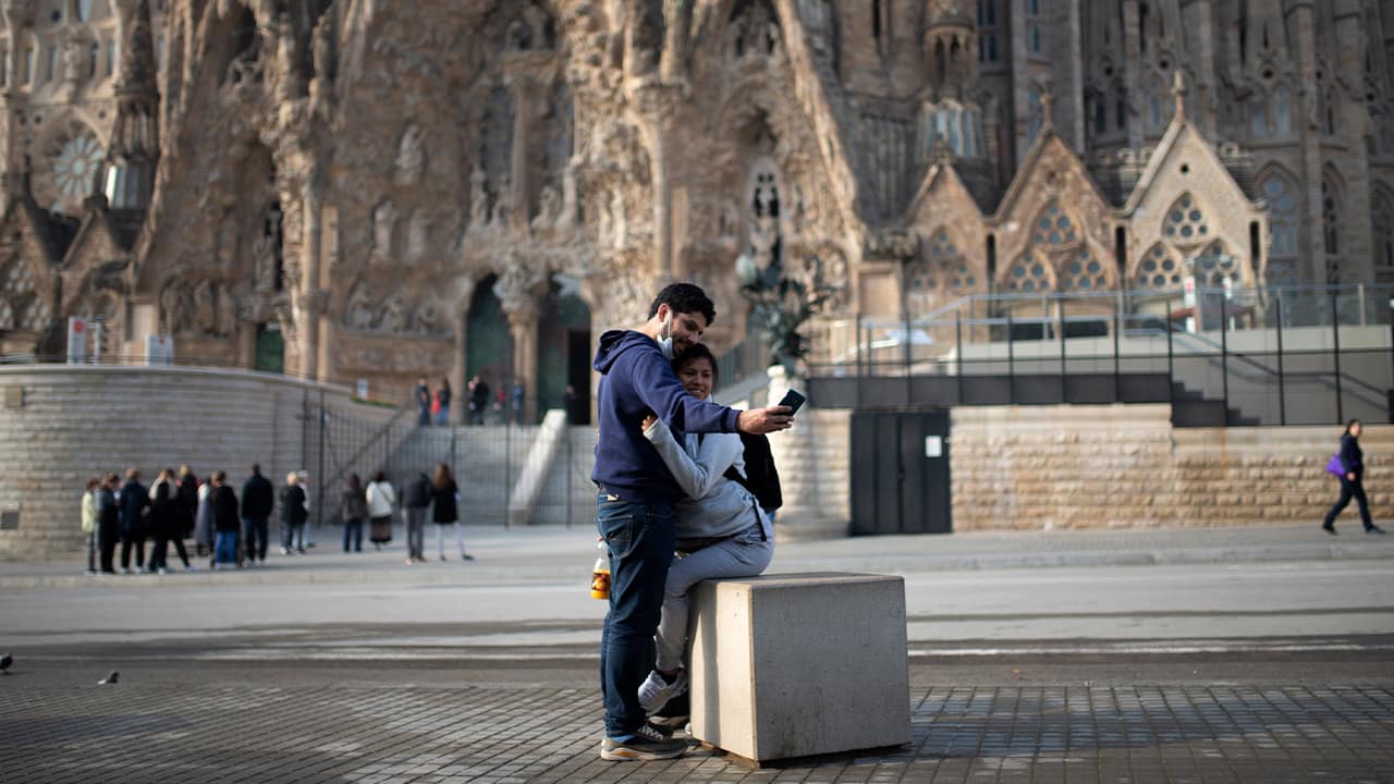 Photo of people taking a photo in Spain