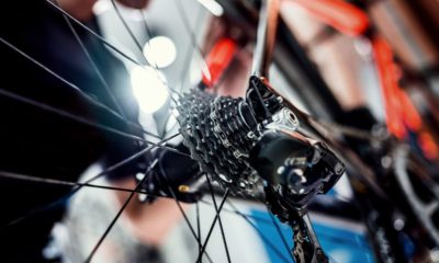 Photo of a bicycle being worked on inside a shop