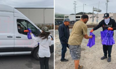 Photo of Elijah Daniel handing out supplies to LA's homeless population