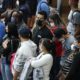 Photo of people wearing masks
